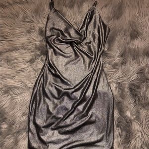 A cute mini grey, silver dress in size small